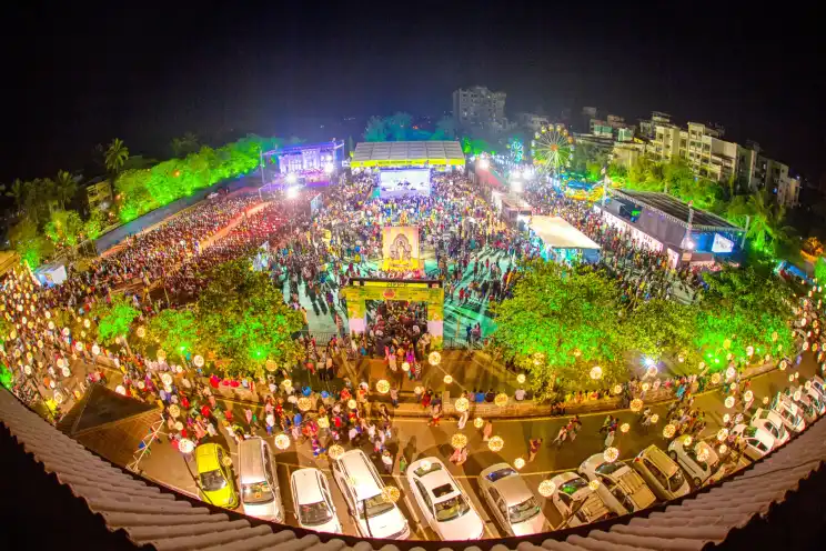 Aerial view of a cultural festival ground with a large crowd