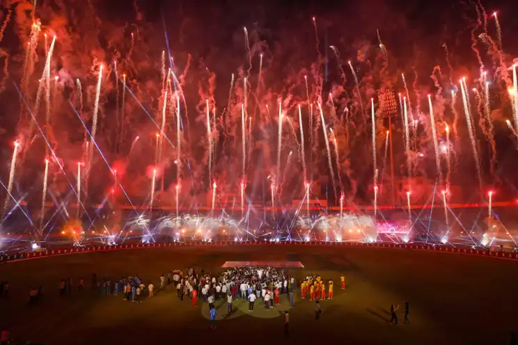 Fireworks over a stadium during a sports event opening ceremony